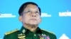 FILE - Commander-in-Chief of Myanmar's armed forces, Senior General Min Aung Hlaing delivers his speech at the IX Moscow conference on international security in Moscow, Russia, June 23, 2021.