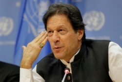 FILE - Imran Khan, prime minister of Pakistan, speaks to reporters during a news conference at United Nations headquarters, Sept. 24, 2019.
