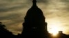 The sun rises over the U.S. Capitol in Washington, Sept. 24, 2013. 