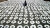 A man lays wreaths during a memorial service for suicide victims in Sydney (file photo).