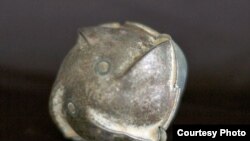 Cluster munitions can release hundreds of bomblets over a wide area. Not all explode after hitting the ground, posing a landmine-like danger. (CMC)