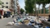 Trash piles up on Mehru Square's street in Phnom Penh, Cambodia, on October 06, 2020. (Aun Chhengpor/VOA Khmer) 