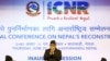 Nepal's Prime Minister Sushil Koirala greets upon his arrival to take part in the International Conference of Nepal Reconstruction in Kathmandu, June 25, 2015. 