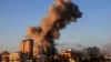 Smoke rises from a building hit in an Israeli airstrike in Tyre, southern Lebanon, Nov. 16, 2024. 