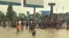 ប្រទេស​កម្ពុជា​ត្រូវ​លិច​លង់​ដោយ​ទឹកជំនន់​ដែលបណ្តាល​មកពី​ទឹក​ភ្លឿង និង​ព្យុះ​។