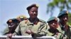 Uganda's President Yoweri Museveni inspects an guard of honor at Soroti, Uganda, during celebrations to mark 30 years of The Uganda Peoples Defence Force, previously the National Resistance Army, February 6, 2011