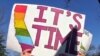 Gay marriage supporters in front of the Supreme Court in Washington, Mar, 26, 2013.
