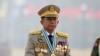 FILE - Myanmar's junta chief Senior General Min Aung Hlaing presides over an army parade on Armed Forces Day in Naypyitaw, Myanmar, March 27, 2021. 