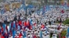 Supporters of Cambodian People's Party gather for their last campaign for the July 29 general election, in Phnom Penh, Cambodia, Friday, July 27, 2018. Political exiles and Western governments are raising concerns about whether Cambodia's elections this weekend will be free and fair. Prime Minister Hun Sen's ruling party has banned the main opposition party, jailed its leaders and other critics and shut independent media outlets. Opposition politicians in exile in the United States, Australia and elsewhere are using social media to urge voters to embrace a "clean finger campaign" and boycott the vote. (AP Photo/Heng Sinith)