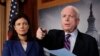 U.S. Republican Senators John McCain (R) and Kelly Ayotte are seen at a news conference on Capitol Hill in Washington, D.C., in this December 21, 2012, file photo.