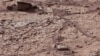 This view shows the patch of veined, flat-lying rock selected as the first drilling site for NASA's Mars rover Curiosity. (Courtesy: NASA)