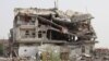 A view of a building destroyed by a Saudi-led air strike is seen in Haradh city of Yemen's northwestern province of Hajja May 20, 2015. 