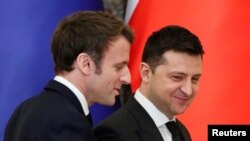 На фото: Президенти Франції та України