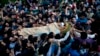 Kashmiri villagers carry body of Burhan Wani, chief of operations of Indian Kashmir's largest rebel group Hizbul Mujahideen, during his funeral procession in Tral, some 38 Kilometers (24 miles) south of Srinagar, Indian-controlled Kashmir, July 9, 2016.