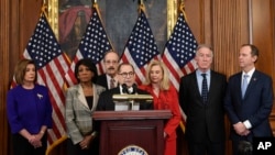 From left House Speaker Nancy Pelosi, Chairwoman of the House Financial Services Committee Maxine Waters, D-Calif., Chairman of the House Foreign Affairs Committee Eliot Engel, D-N.Y., House Judiciary Committee Chairman Jerrold Nadler, D-N.Y., Chairwoman 