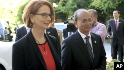 President of Burma Thein Sein (R) meets with Australian Prime Minister Julia Gillard at Parliament House in Canberra, Australia, March 18, 2013.