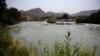 La rivière Kunene, près des chutes d'Epupa, dans le nord de la Namibie, à la frontière avec l'Angola, le 20 août 2010. 