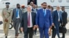 Guyanese President Irfaan Ali, right, walks with St. Vincent and the Grenadines Prime Minister Ralph Gonsalves as Ali arrives at the Argyle International Airport in Argyle, St. Vincent, on Dec. 14, 2023.