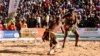 Wrestlers fight during semi-final of the National Sabre, a traditional wrestling competition in Agadez, Niger, on Dec. 31, 2023.