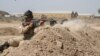 Iraqi soldiers train with members of the U.S. Army 3rd Brigade Combat Team, 82nd Airborne Division, at Camp Taji, Iraq, in this U.S. Army photo released June 2, 2015. 