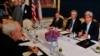 Iran's Foreign Minister Mohammad Javad Zarif (L) meets with U.S. Secretary of State John Kerry (R) at talks between the foreign ministers of the six powers negotiating with Tehran on its nuclear program in Vienna, July 13, 2014.