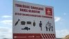 Mina təhlükəsi ilə bağlı reklam lövhəsi