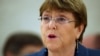 FILE - U.N. High Commissioner for Human Rights Michelle Bachelet attends a session of the Human Rights Council at the United Nations in Geneva, Switzerland, Feb. 27, 2020.
