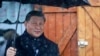 ប្រធានាធិបតី​ចិន​លោក Xi Jinping កាន់ឆ័ត្រ​នៅ​ខាងក្រៅ​ភោជនីយដ្ឋាន​មួយ​នៅ​ក្នុងប្រទេស​បារាំង​កាលពីថ្ងៃទី​៧ ឧសភា​ ឆ្នាំ២០២៤។