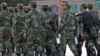 资料照片: 2011年8月4日，武装警察在新疆喀什维吾尔族地区巡逻