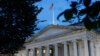 FILE - The US Treasury Department building is seen at dusk in Washington, June 6, 2019. 