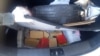 Paquetes en forma de ladrillos que contienen cocaína fueron encontrados en el auto en el que viajaba el excónsul de Bolivia en Salta, Diego Vega Ibarra. Foto de la Gendarmería Nacional Argentina del 17 de diciembre de 2019.