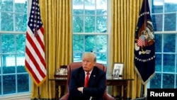 Le président américain Donald Trump, dans le bureau ovale de la Maison Blanche à Washington, le 20 août 2018. REUTERS / Leah Millis.