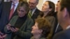 Senate Environment and Public Works Committee Chairman Sen. Barbara Boxer, D-Calif., left, checks her phone during a meeting of the Senate Climate Action Task Force prior to taking to the Senate Floor all night to urge action on climate change, March 10, 2014.
