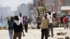 Opposition supporters clash with police in the Jacaranda grounds quarter in Nairobi, Kenya, Nov. 28, 2017.