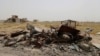 Military vehicle wreckage belonging to Islamic State militants is seen in Falluja, Iraq, June 18, 2016.