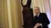 Senate Minority Leader Mitch McConnell of Ky. walks to the Senate floor on Capitol Hill in Washington, Thursday, Dec. 27, 2012.
