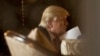 FILE - President-elect Donald Trump attends a meeting at Mar-a-Lago, in Palm Beach, Florida, Dec. 21, 2016.