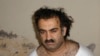 FILE - Khalid Sheikh Mohammed, the alleged Sept. 11 mastermind, is seen shortly after his capture on March 1, 2003. The U.S. Defense Department will appeal a ruling that would allow Mohammed and other defendants to avoid the death penalty, it announced on Nov. 9, 2024.