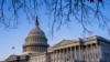 The Capitol and Senate are seen at sunrise on the first full day of the impeachment trial of President Donald Trump on charges of abuse of power and obstruction of Congress, in Washington, Jan. 21, 2020. 