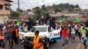 FILE - This video grab shows coup supporters cheering police officers in Libreville, Gabon, on Aug. 30, 2023. 