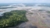 FILE - An overview of the Niger Delta, where signs of oil spills can be seen in the water in Port Harcourt, Nigeria, Aug. 1, 2018. 