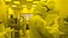 Researchers work in a clean room at the expanded University of Michigan Lurie Nanofabrication Facility in Ann Arbor, Michigan, April 10, 2008.