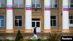 В тимчасово окупованому Мелітополі вивісили російські прапори