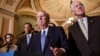 Senate Minority Leader Mitch McConnell, center, accompanied by, from left, Senators John Thune, John Barrasso and Senate Minority Whip John Cornyn, Capitol Hill, Washington, Sept. 24, 2013.