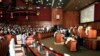 Empty seats, right side, which is believed to be sited by opposition of Cambodia National Rescue Party's parliamentary as Prime Minister Hun Sen, rear center, sits in the session hall of National Assembly, file photo. 