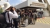Journalists wait at Phnom Penh International airport, June 4, 2015, for the arrival of refugees from the Pacific Island of Nauru. (Phorn Bopha/VOA Khmer)