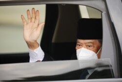 Malaysian Prime Minister Muhyiddin Yassin arrives at the National Palace for a meeting with the king, in Kuala Lumpur, Malaysia, Aug. 16, 2021.