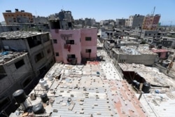 FILE PHOTO: A view shows houses of Palestinians at Khan Younis refugee camp in the southern Gaza Strip, June 20, 2018.