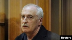 Russian physicist Valery Golubkin, accused of treason, attends a court hearing in Moscow
