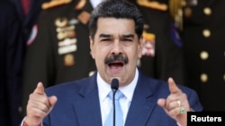 Venezuela's President Nicolas Maduro speaks during a news conference at Miraflores Palace in Caracas, Venezuela, March 12, 2020. REUTERS/Manaure Quintero